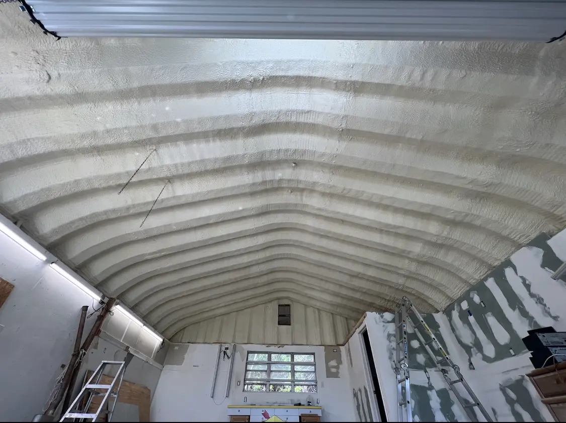 Spray polyurethane foam applied to the underside of a metal roof deck in Cottleville